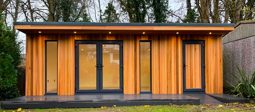garden-room-front-view-composite-decking-storage-owl-garden-studios-slide